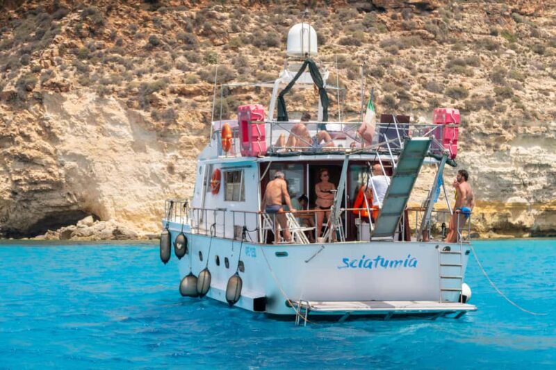 Lampedusa: Yacht excursion, swimming stops and typical lunch - Meeting Point and Departure Details in Lampedusa