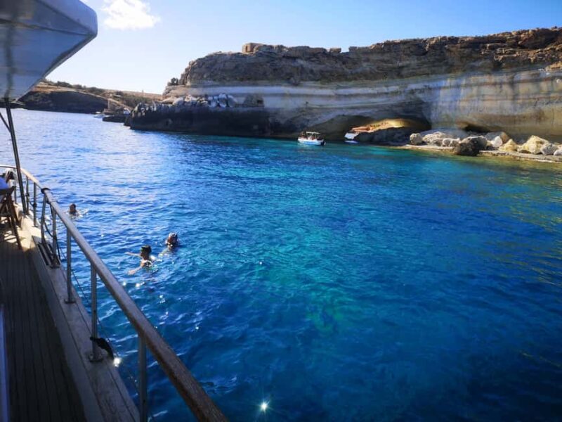Lampedusa: Yacht excursion, swimming stops and typical lunch - Iconic Stops on the North Coast and Muro Vecchio