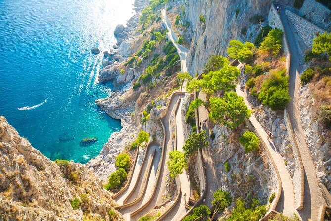 Land and Sea Small Group Capri Island Tour from Naples Main Port - Scenic Water Tour: Exploring Capri’s Famous Caves and Faraglioni Rocks