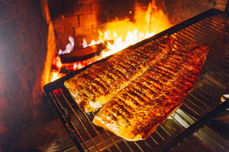 Lapland: Hiking, Ice Fishing, Floating & BBQ Snow Adventure - Enjoying a Traditional Lappish BBQ