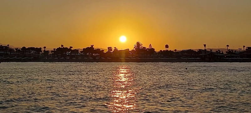 Larnaca: Sunset Cruise with Unlimited Wine & Beers - Relaxing at Mackenzie Beach and Swimming Opportunities