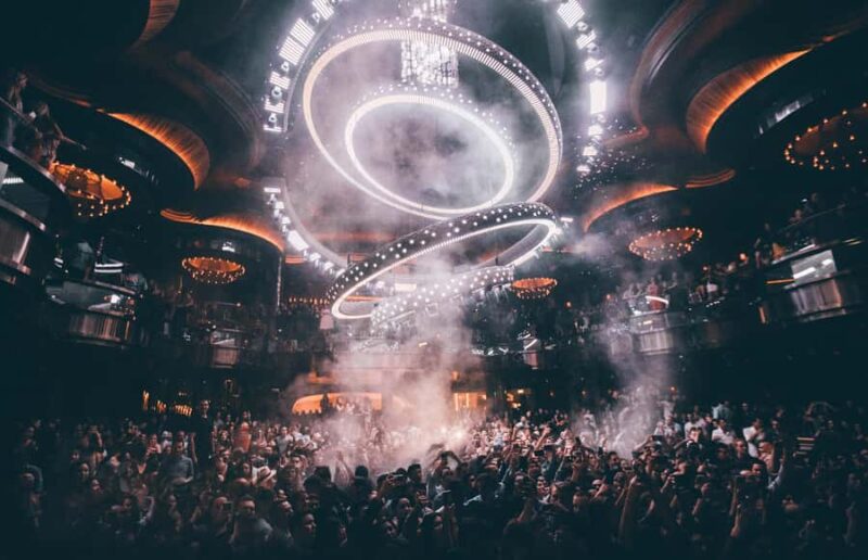 Las Vegas: Nightclub on Wheels Scenic Party Bus Experience - Visiting the Las Vegas Sign for Photo Memories