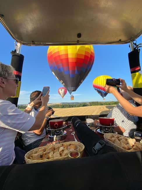 Lausanne: Swiss Fondue Flight in a Hot Air Balloon - Expert Pilots and Guided Insights During the Flight
