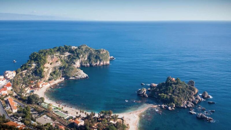 Letojanni, Taormina & Isola Bella: Daily group tour with an aperitif - Visiting the Luxurious Bay of Mazzarò