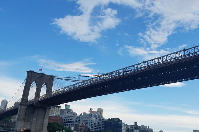 Let's take a walk across the iconic Brooklyn Bridge - Walking Across the Brooklyn Bridge: The Tour’s Crown Jewel