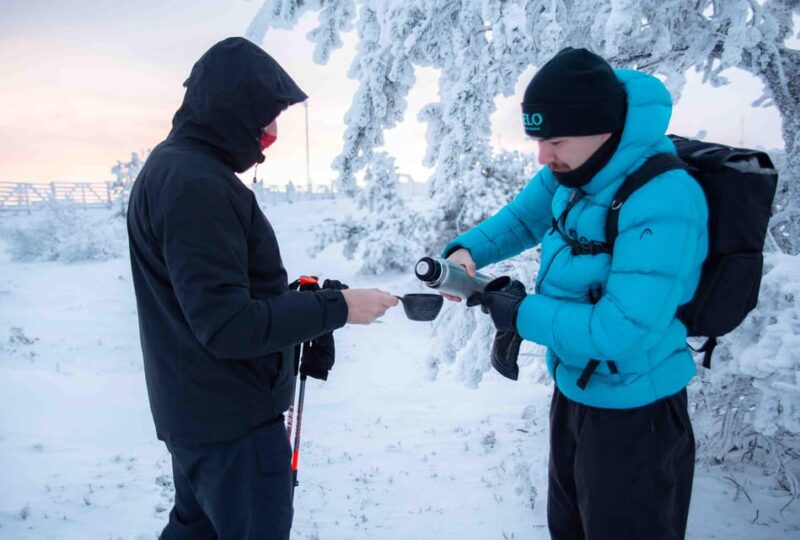 Levi: Guided Snowshoeing Adventure - Comfort and Warmth with Hot Drinks and Pastry