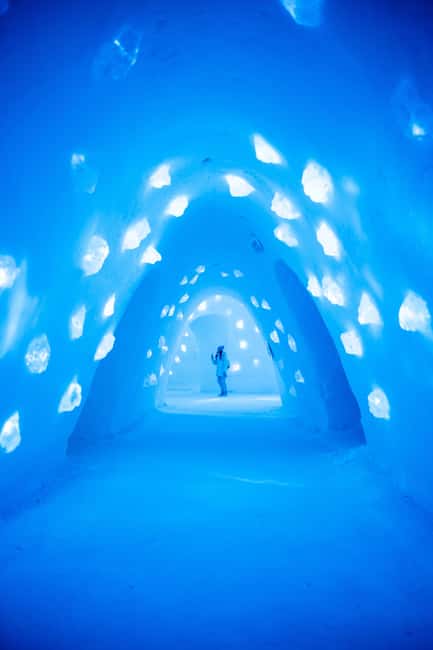 Levi: Guided Trip to Lainio SnowVillage - Warming Up with Hot Drinks and Finnish Buns