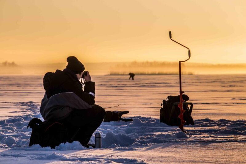 Levi: Ice Fishing on a Frozen Lake - Discover Levis Unique Ice Fishing Adventure in Lapland