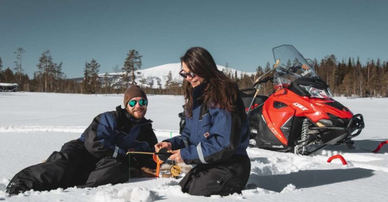 Levi: Snowmobile Safari with Ice Fishing and Outdoor Lunch - Ice Fishing in the Scandinavian Wilderness