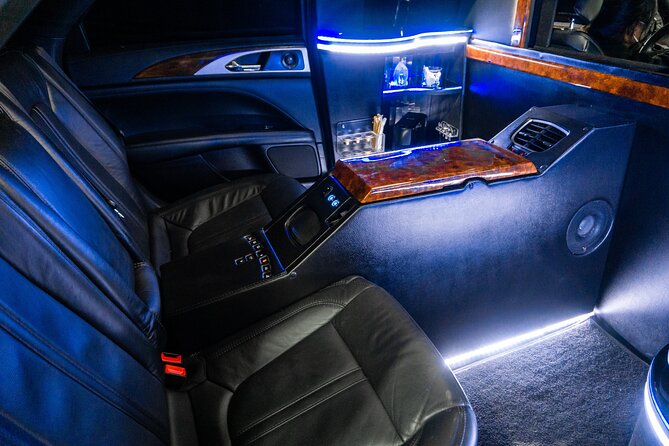 Lincoln Stretch limo from Cancun Hotel Zone to Cancun Airport - Onboard Features: Entertainment and Refreshments