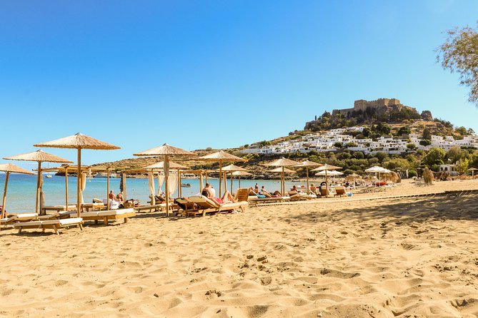 Lindos Day Cruise from Rhodes Town with Swimming stops and Hotel Transfers - Exploring Lindos Village and Its Narrow Streets