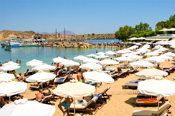 Lindos Day Cruise from Rhodes Town with Swimming stops and Hotel Transfers - Lindos Beach and Free Exploration Time