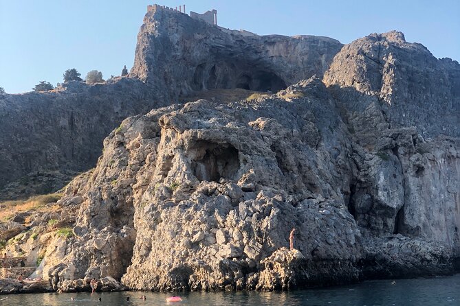 Lindos day trip - Gems of Lindos - private boat cruise - Entertainment and Comfort with Bluetooth Music and Modern Amenities