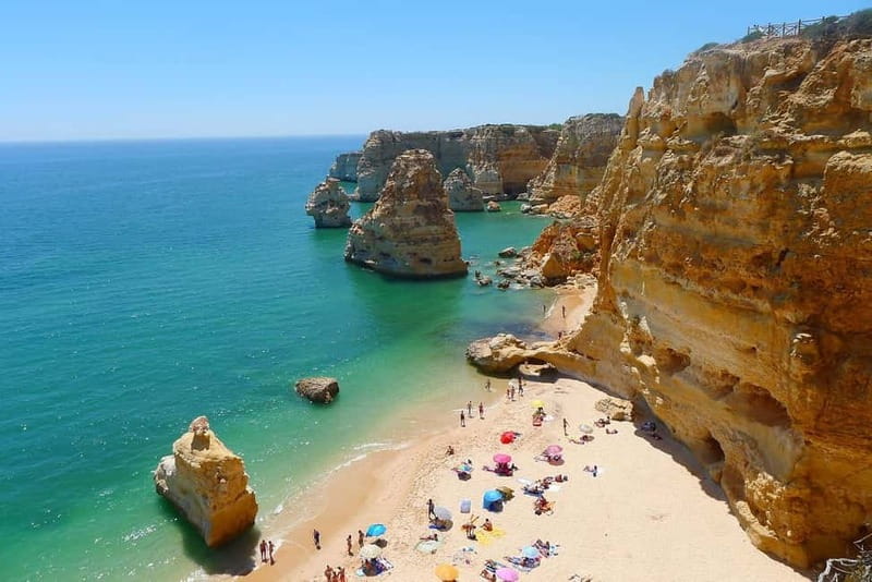 Lisbon: Algarve, Benagil Cave, Carvoeiro & Lagos Day Trip - Exploring Algar Seco and Its Cliff Jumps