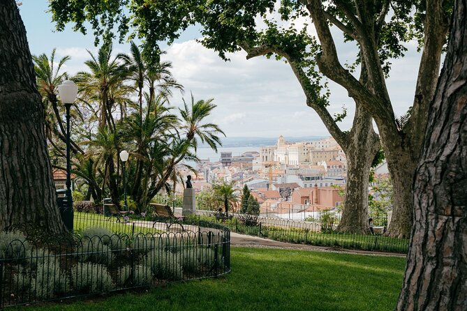 Lisbon All Viewpoints 3 Hour Tuk Tuk Tour with True Local Guide - Santa Luzia Viewpoint: A Floral Terrace with Panoramic Views