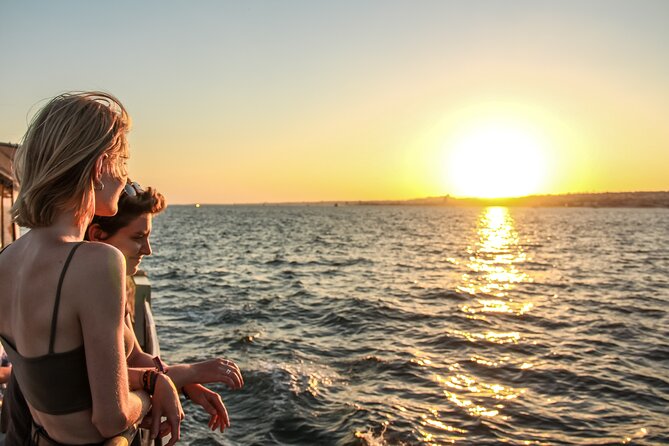 Lisbon Booze Cruise with Live DJ and Open Bar - Music and Drinks: The Atmosphere Aboard