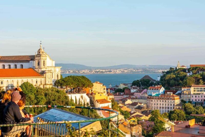 Lisbon by Night: Golden and Blue Hour Photography Walk - Photographing Vintage Yellow Trams and Illuminated Landmarks