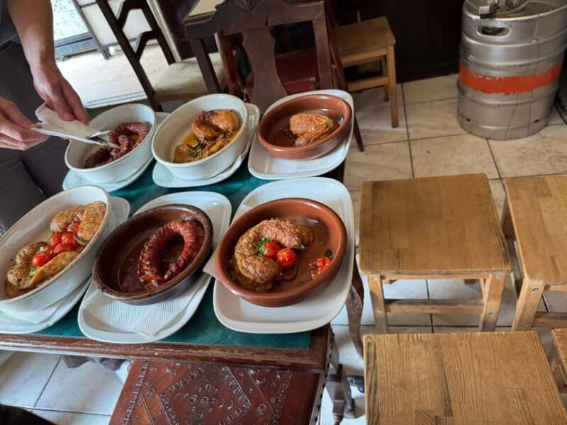Lisbon: Culinary guided tour with dinner off the beaten track - Tasting Regional Flavors at Graça and Vila Berta