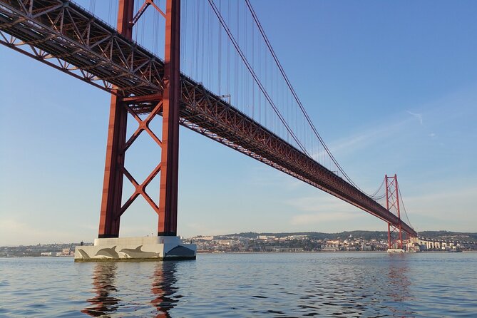 Lisbon Day Boat Tour with wine and guided tour - Enjoying Lisbon’s Views with Wine and WiFi on Board