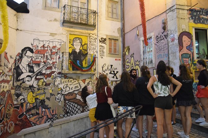 Lisbon Fado Experience: Walking Tour, Dinner and Live Music Show - Exploring Lisbon’s Fado Neighborhoods: Alfama and Mouraria