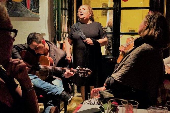 Lisbon Fado Experience: Walking Tour, Dinner and Live Music Show - The Dinner Experience: Local Flavors and Atmosphere