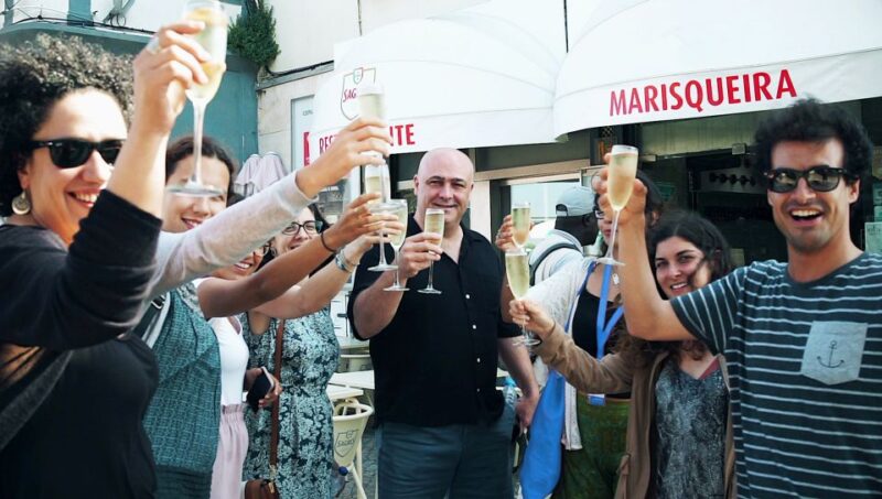 Lisbon Hidden Gems Walk: Traditions, Lunch & Ferry Ride - Visit Carmo Convent and Lisbon Landmarks from a Scenic Viewpoint