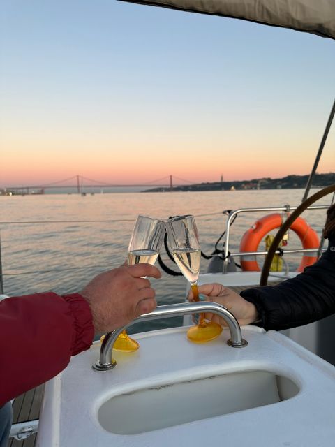 Lisbon: Romantic Cruise with Wine & Portuguese Tapas - The Unique Experience of Sailing and Sunset Viewing