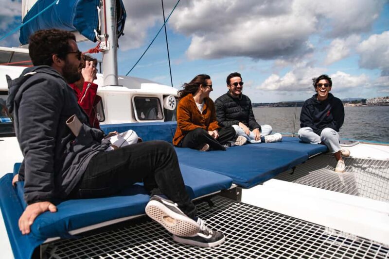 Lisbon: Sightseeng & Sunset Sailing Boat with a Local Guide - Starting at Doca de Santo Amaro in Lisbon