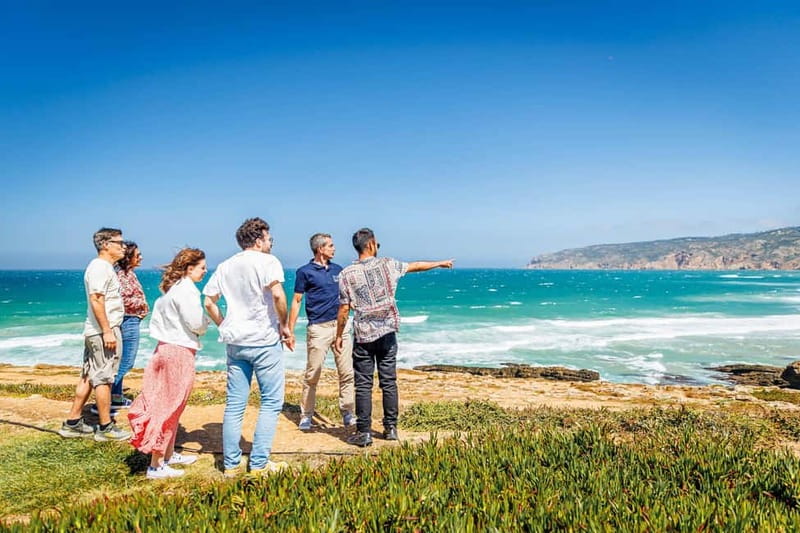 Lisbon: Sintra Cascais & Pena Palace Small Group Tour - Passing Guincho Beach and Coastal Views