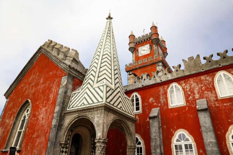 Lisbon: Sintra, Pena Palace, Belém Tour + sunset Boat Cruise - Visiting Sintra’s Colorful Pena Palace with Guided Insights