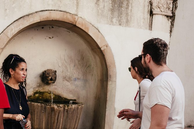 Lisbon Small-Group Food Tour with 18 Tastings in Alfama District - Food Tastings and Beverages in Authentic Settings