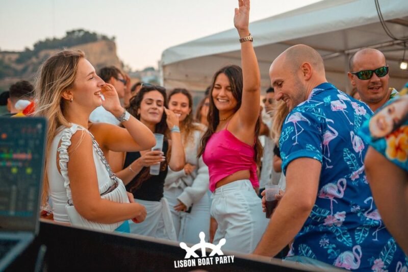 Lisbon: Sunset Boat Party with 2 Drinks and Free Club Entry - Music and Atmosphere on board