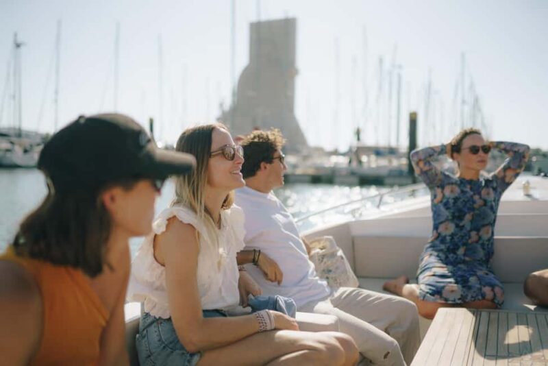 Lisbon Sunset Boat Tour with local Snacks & Drinks - Local Snacks, Green Wine, and a Laid-back Atmosphere