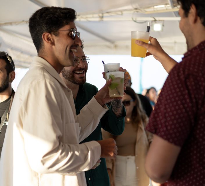 Lisbon: Sunset Boat Tour with Music and Drinks - The Crew and Guide