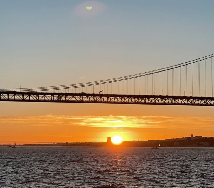 Lisbon: Sunset Boat Tour with Wine - Enjoying the Sunset with a Drink in Hand