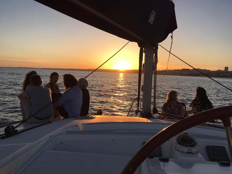 Lisbon: Sunset Catamaran Cruise with Drinks - The Experience on Board