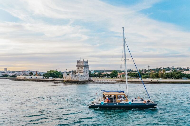 Lisbon: Sunset Catamaran Tour with Music and Drink - Discover Lisbon from the Water with a Sunset Catamaran Tour for $31