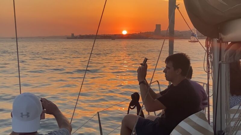 Lisbon: Sunset Cruise with Drinks - Passing Under the 25 de Abril Bridge