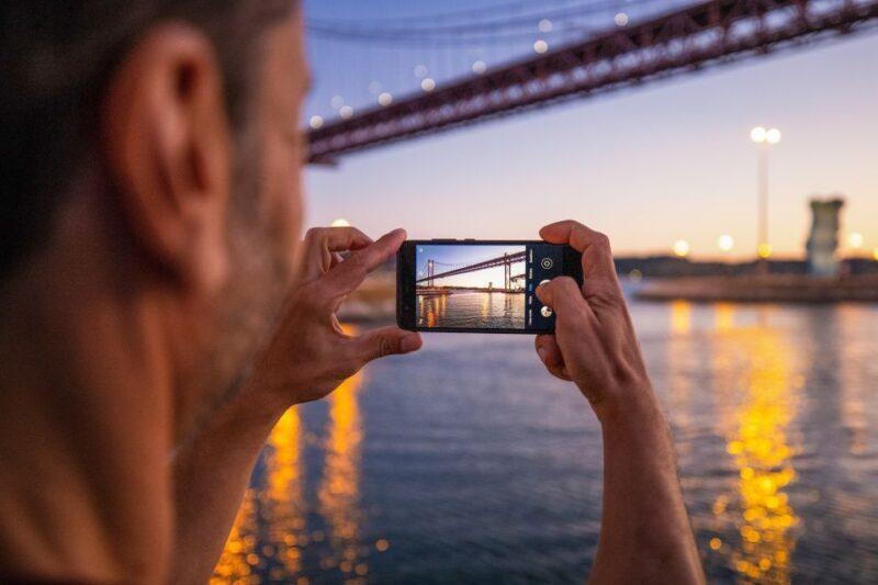 Lisbon: Sunset Cruise with Live DJ and Drinks - Enjoying the Sunset and Scenic Views