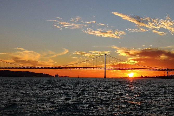 Lisbon Sunset Sailing Tour on Luxury Sailing Yacht with 2 Drinks - Key Points