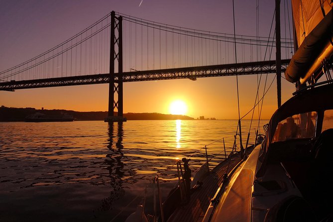 Lisbon Sunset Sailing Tour on Luxury Sailing Yacht with 2 Drinks - Savor Portuguese Wine and Appetizers on Deck