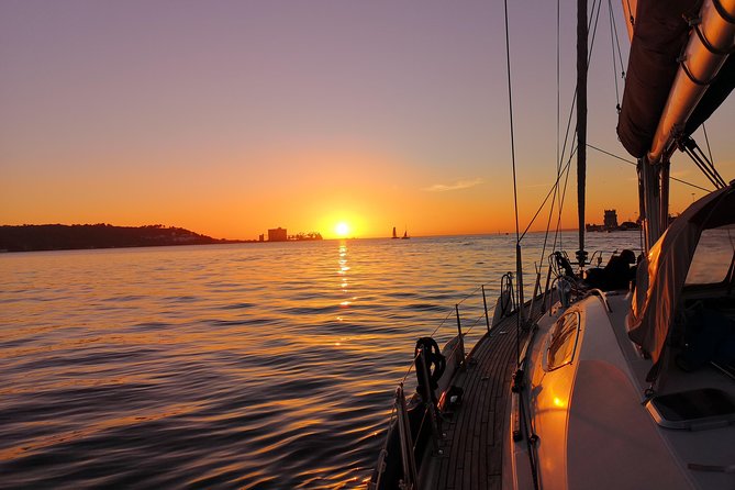 Lisbon Sunset Sailing Tour on Luxury Sailing Yacht with 2 Drinks - The Magic of Lisbon’s Sunset from the Water
