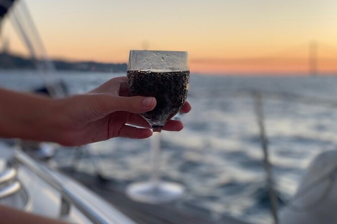 Lisbon: Sunset Sailing with Local Wine & Stunning Views - The Guide and Hospitality