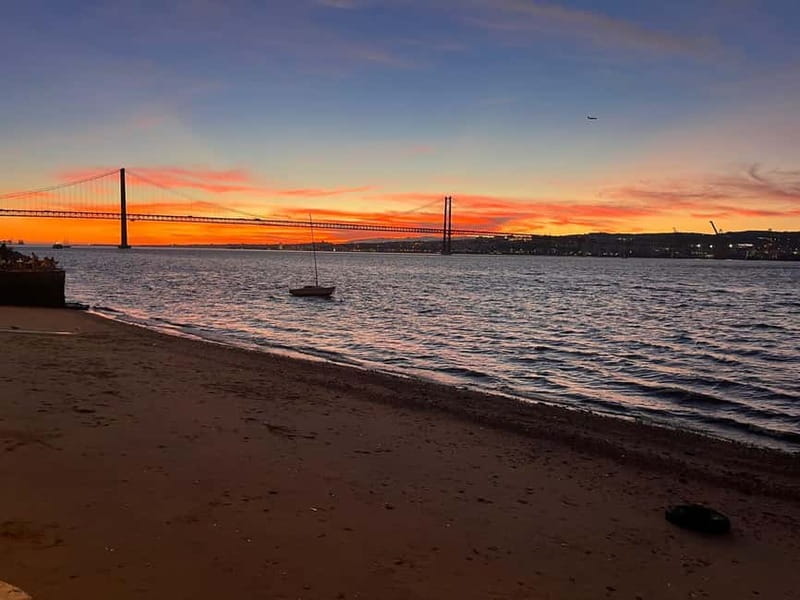 Lisbon: Sunset Sailing with Local Wine & Stunning Views - The Charm of Sunset Over Lisbon