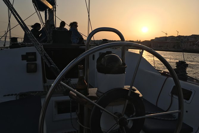 Lisbon Sunset Sensations on a Private Sailing Boat with wine&snacks - Discover Lisbon’s Landmarks from the Water