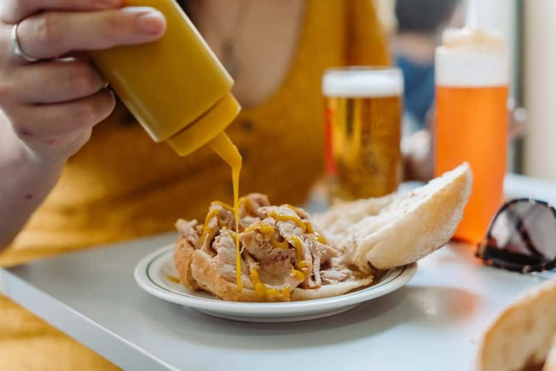 Lisbon: Tastes and Traditions Guided Food Tour - Enjoying Lisbon’s Iconic Cherry Liqueur and Local Drinks