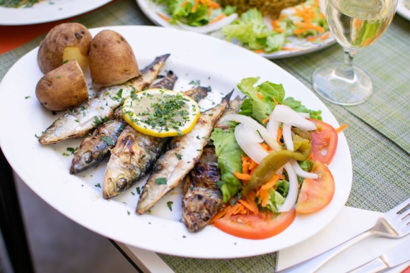 Lisbon Traditional Portuguese Food and Sightseeing Tour - Visiting Local Restaurants and Cafés in Lisbon