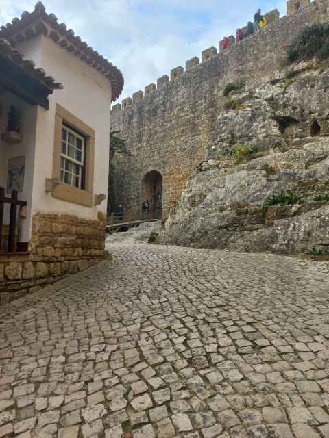 Lisbon: Transfer to Porto with Obidos and Nazare - Personalization and Flexibility in Your Stops