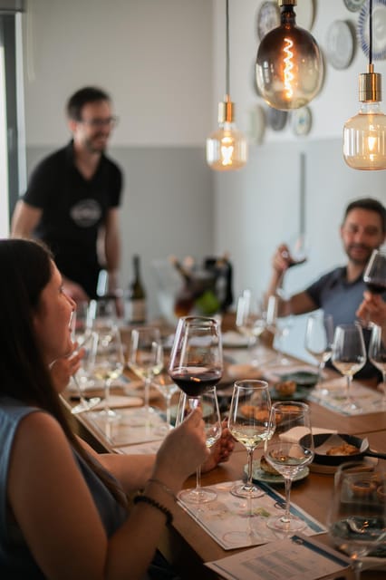 Lisbon: Wine Tasting and Food Pairing Experience - Paired Petiscos: Enhancing the Wine Experience