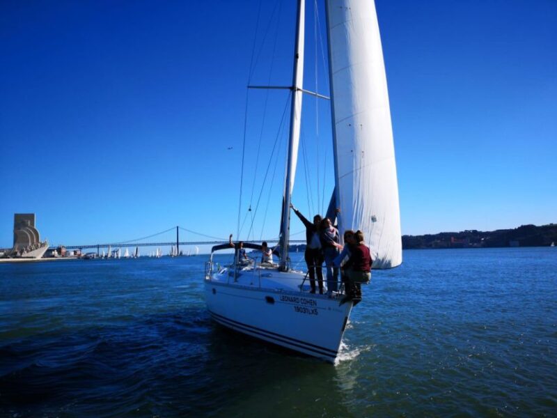 Lisbon: Yacht Sailing Tour With Portuguese Wine and History - Practical Logistics and Group Size